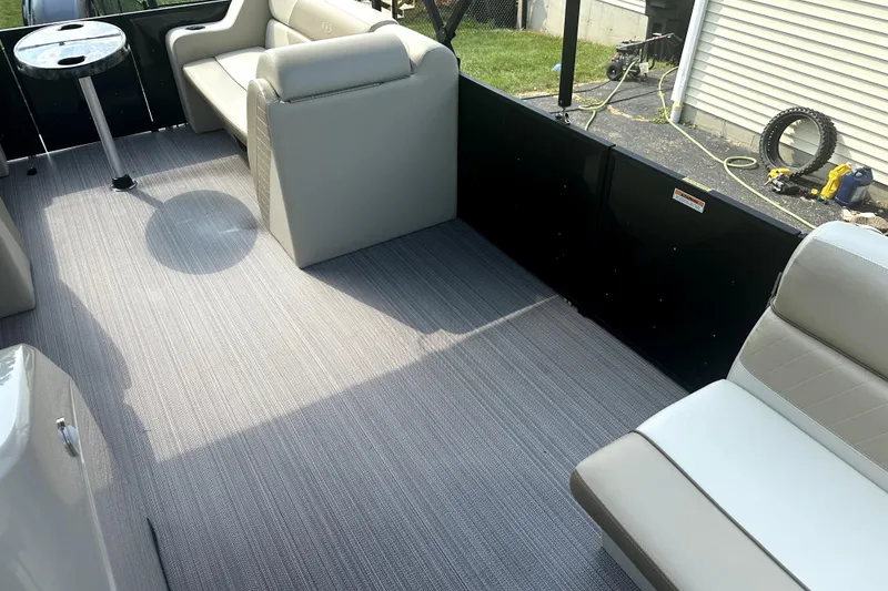 Slide: The Image of Interior of 2021 Veranda Vista 22RC pontoon boat with seating and table. - 31