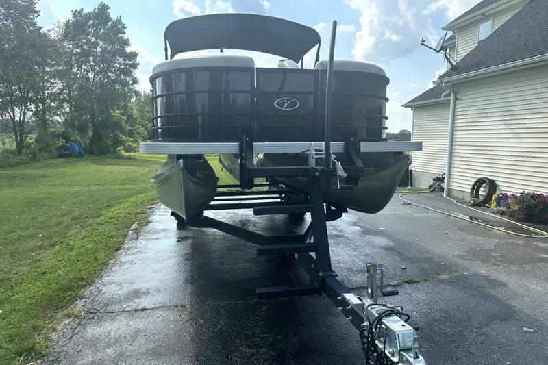 Slide: The Image of 2021 Veranda Vista 22RC pontoon boat on trailer in driveway, sunny day. - 4