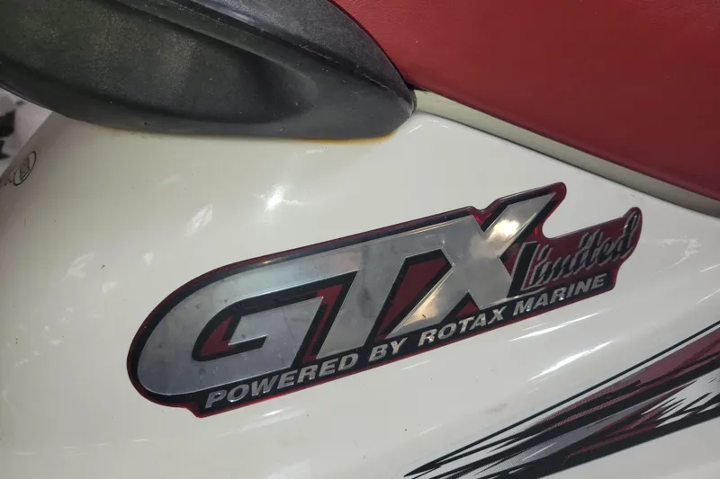 Slide: The Image of 1998 SkiDoo GTX Limited logo, powered by Rotax Marine, on white body. - 3