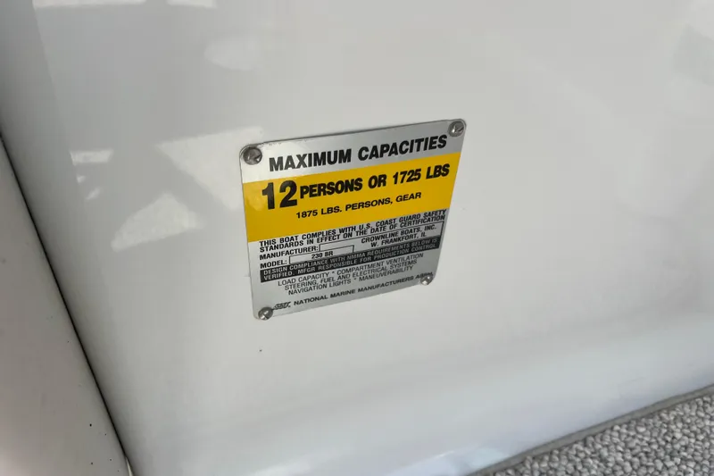 Slide: The Image of Capacity label on 2003 Crownline 230 BR boat, maximum 12 persons or 1725 lbs. - 38