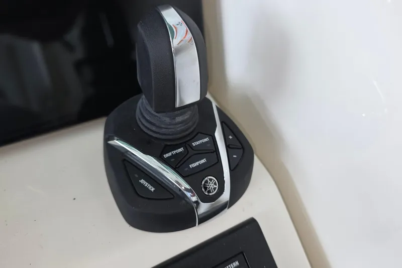 Slide: The Image of Joystick control panel on 2024 Pursuit DC 326 Dual Console boat. - 11