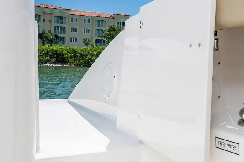 Slide: The Image of Manufacturer Provided Image: 2024 Pursuit DC 326 Dual Console boat with fresh water access. - 14