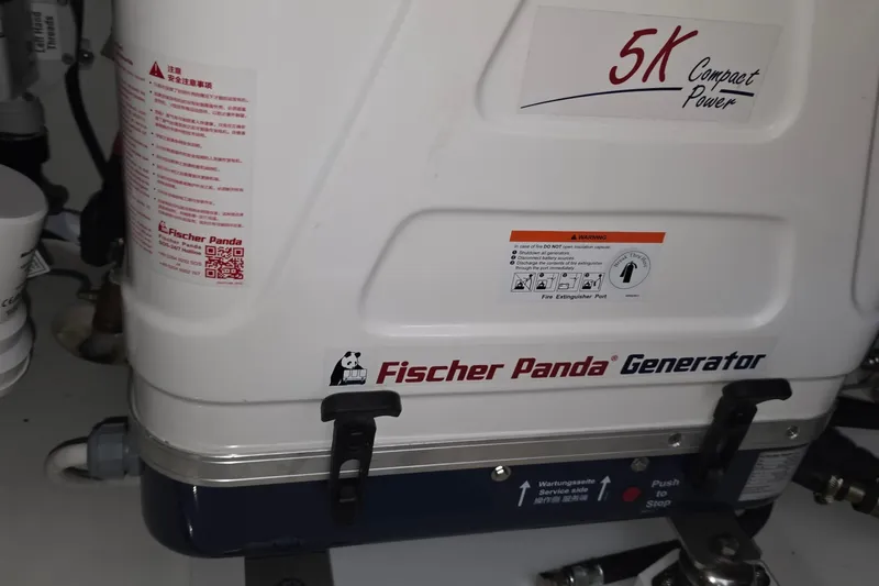 Slide: The Image of Fischer Panda generator in a 2024 Pursuit DC 326 Dual Console boat. - 29