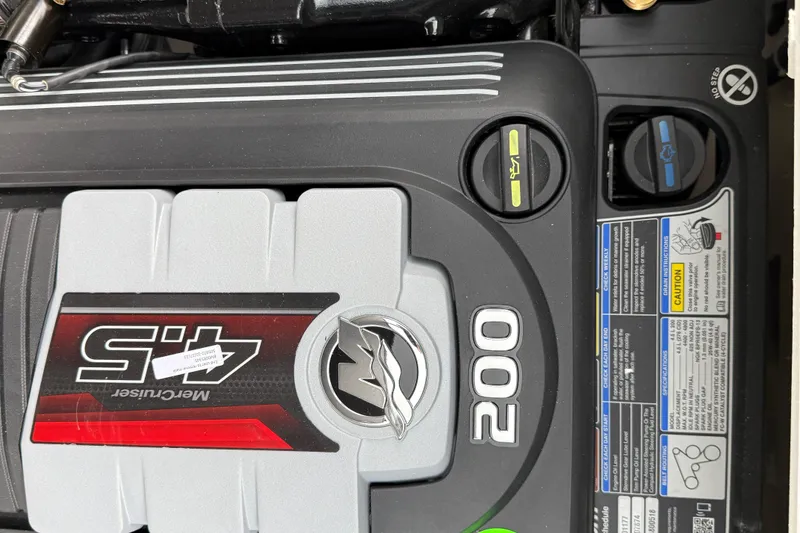 Slide: The Image of Engine of 2025 Sea Ray SPX 190 boat, featuring MerCruiser 4.5L 200 horsepower. - 12