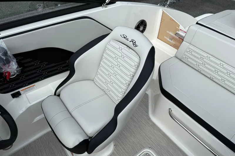 Slide: The Image of 2025 Sea Ray SPX 190 boat interior with white and black seating. - 6