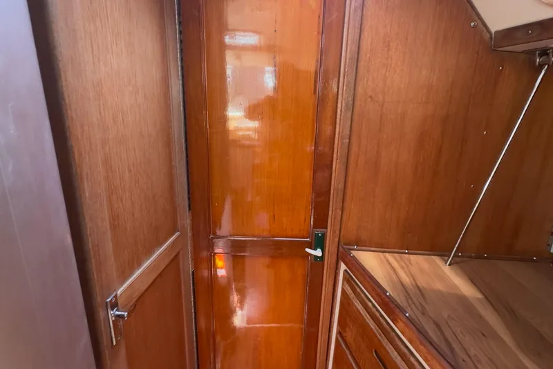 Slide: The Image of Interior of 1998 Catalina 36 MkII sailboat with polished wooden cabinetry. - 6