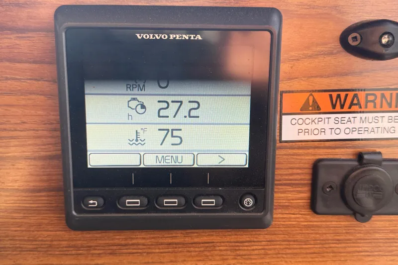 Slide: The Image of Volvo Penta display on 2024 Ranger Tugs R31CB, showing engine hours and temperature. - 29