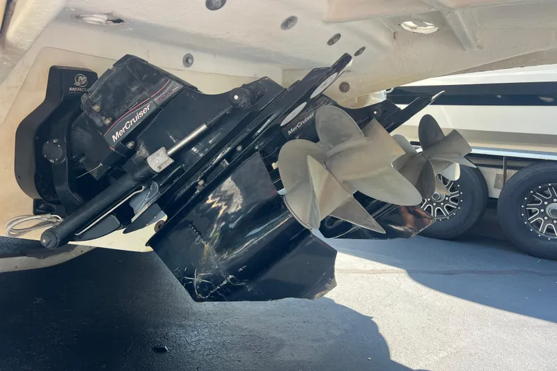 Slide: The Image of 2005 Sea Ray 290 SLX boat with MerCruiser outdrive and propeller detail. - 24