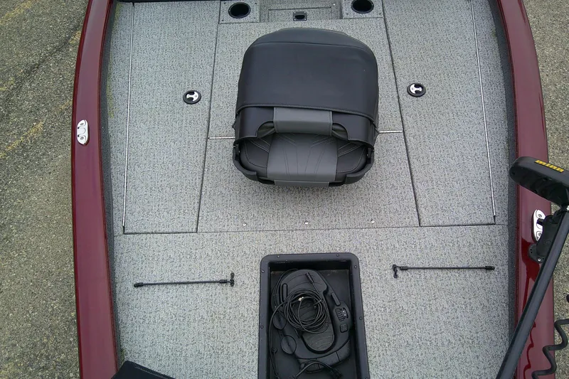 Slide: The Image of 2021 Tracker Pro Team 175 TXW Tournament Edition boat deck with seat and storage compartments. - 12