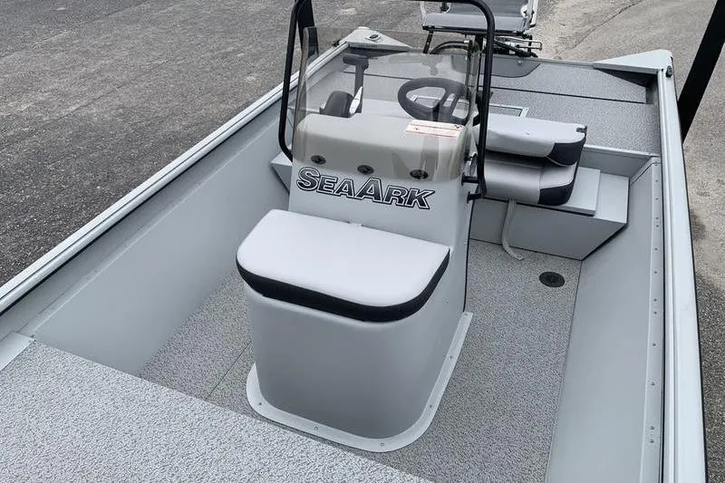 Slide: The Image of 2026 SeaArk Shadow 18 Center Console boat interior with steering console and seating. - 14