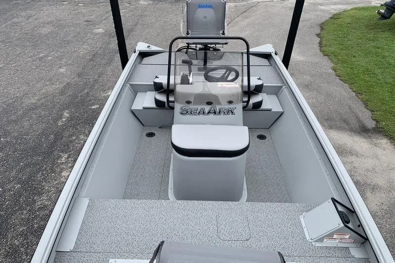 Slide: The Image of 2026 SeaArk Shadow 18 Center Console boat, featuring spacious deck and modern design. - 2