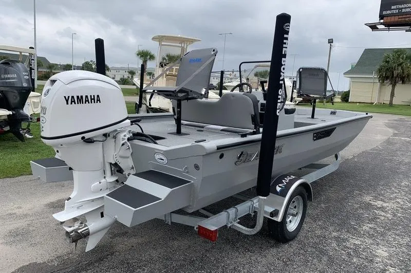 Slide: The Image of 2026 SeaArk Shadow 18 Center Console boat with Yamaha engine on trailer. - 4