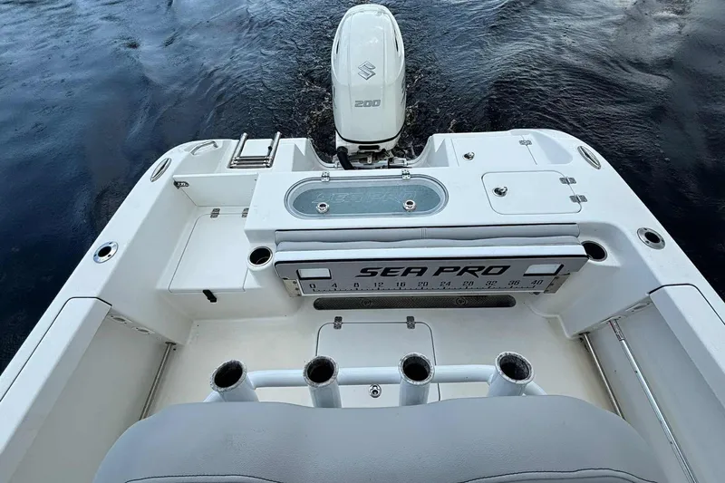 Slide: The Image of 2020 Sea Pro 219 Center Console boat with Suzuki outboard motor on water. - 12