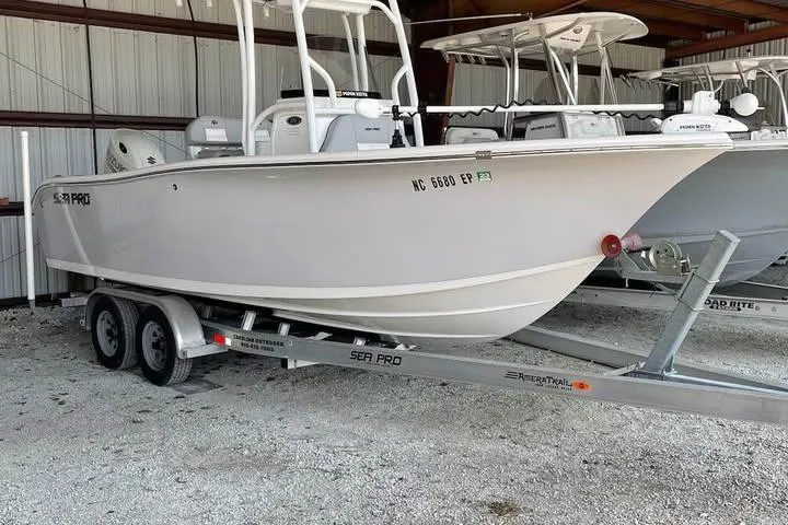 Slide: The Image of 2020 Sea Pro 219 Center Console boat on trailer in storage facility. - 23