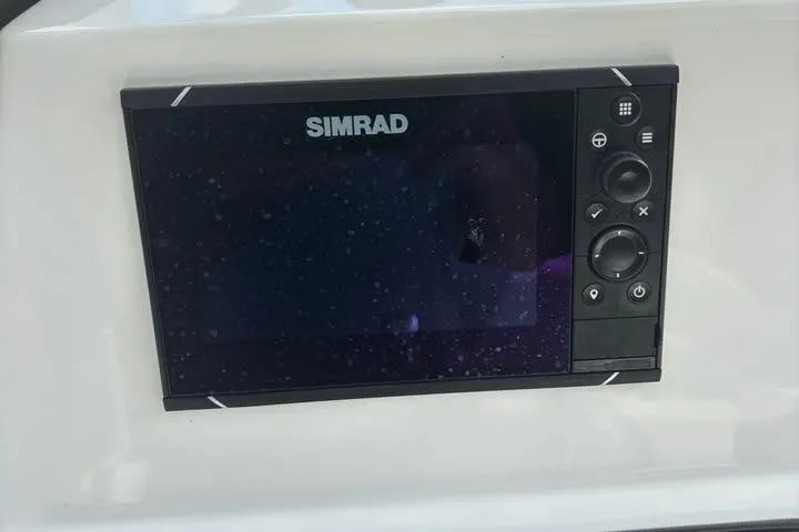 Slide: The Image of Simrad display on 2020 Sea Pro 219 Center Console boat dashboard. - 25