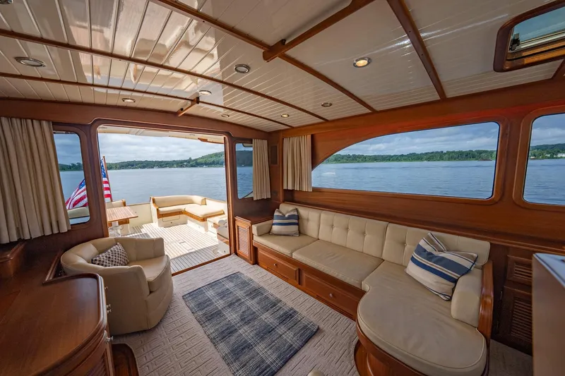 Slide: The Image of Luxurious interior of 2007 Vicem 65 yacht with elegant seating and scenic water views. - 13