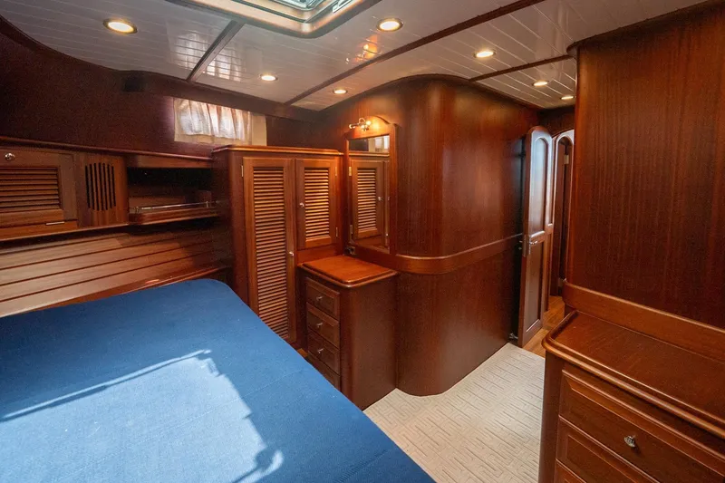 Slide: The Image of Luxurious wooden interior of 2007 Vicem 65 yacht cabin with elegant furnishings. - 29