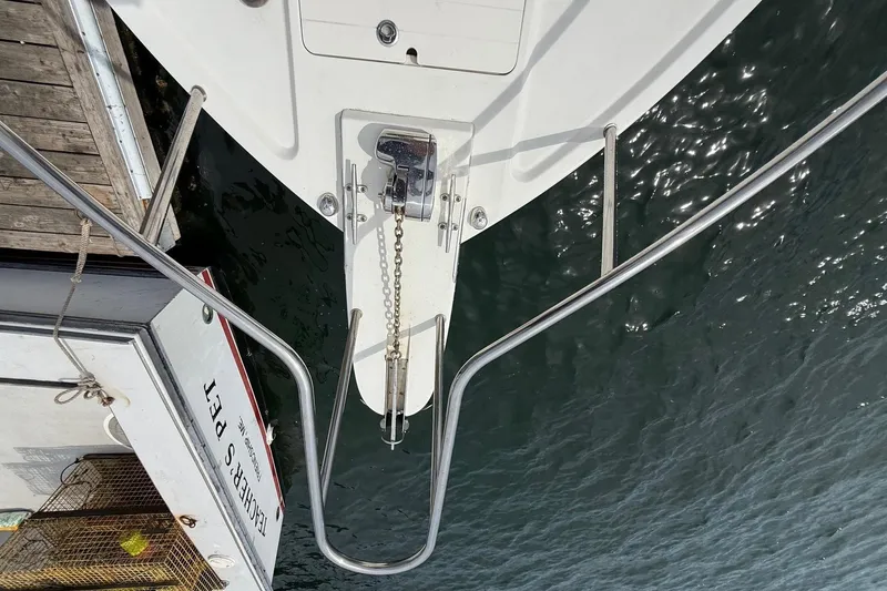 Slide: The Image of Overhead view of 2015 Parker 2510 XLD Walkaround boat docked by water. - 20
