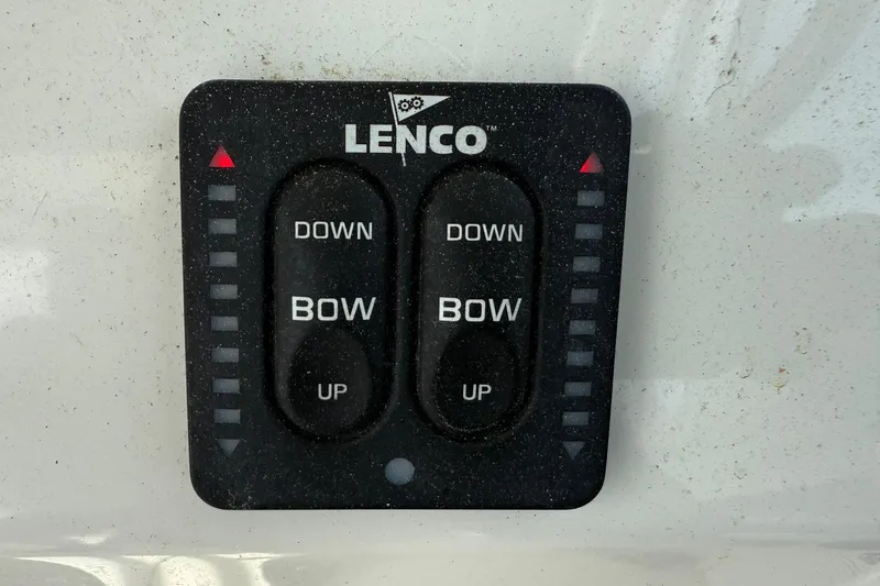 Slide: The Image of Lenco trim tab control panel on 2015 Parker 2510 XLD Walkaround boat. - 25