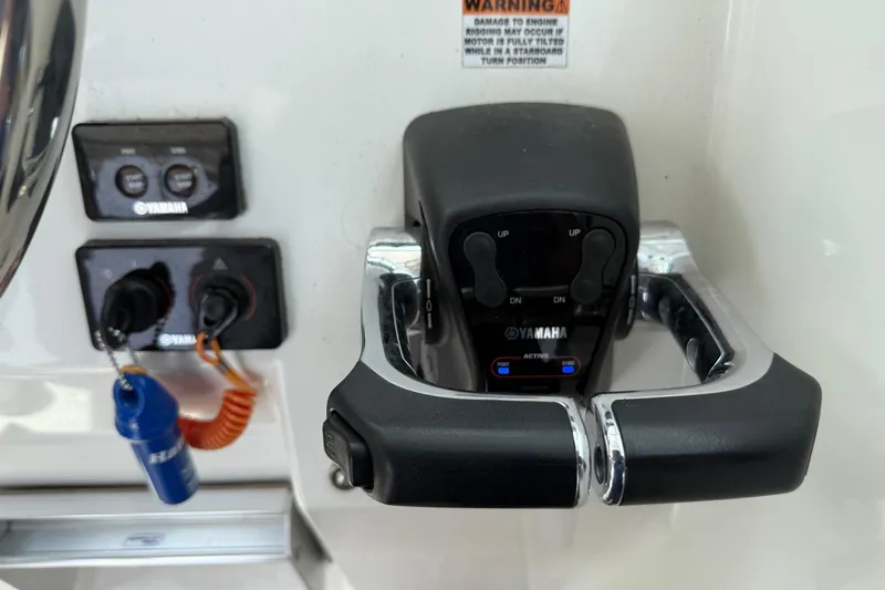 Slide: The Image of Yamaha control panel on 2015 Parker 2510 XLD Walkaround boat. - 30