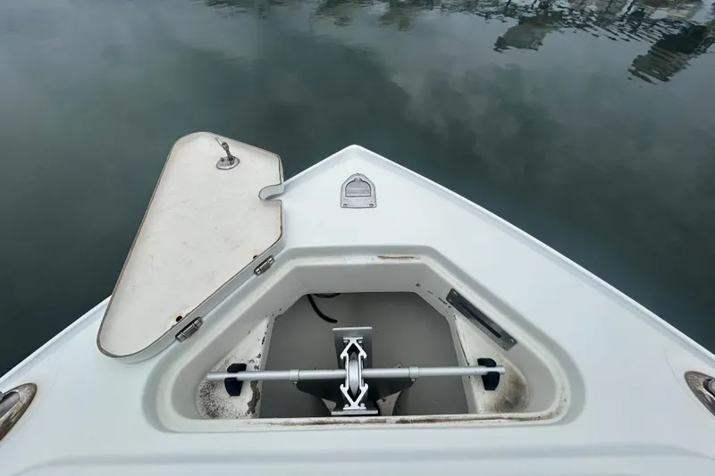 Slide: The Image of Bow of 2006 Sailfish 2660 CC boat with open anchor locker. - 14