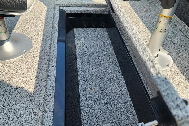 Slide: The Image of 2024 Polar Kraft Frontier 165 SCJ boat interior with textured flooring and seating mounts. - 37