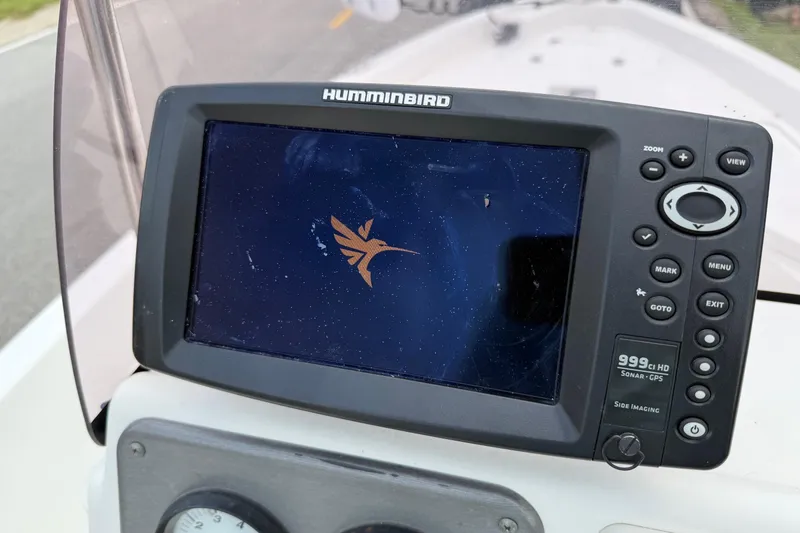 Slide: The Image of Humminbird sonar GPS display on 2013 NauticStar 1910 NauticBay boat dashboard. - 16