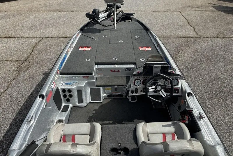 Slide: The Image of 2020 Bass Cat Cougar FTD boat interior with steering console and seating. - 12