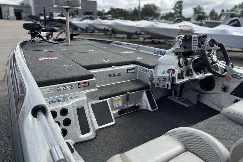 Slide: The Image of 2020 Bass Cat Cougar FTD boat interior with steering wheel and control panel. - 9