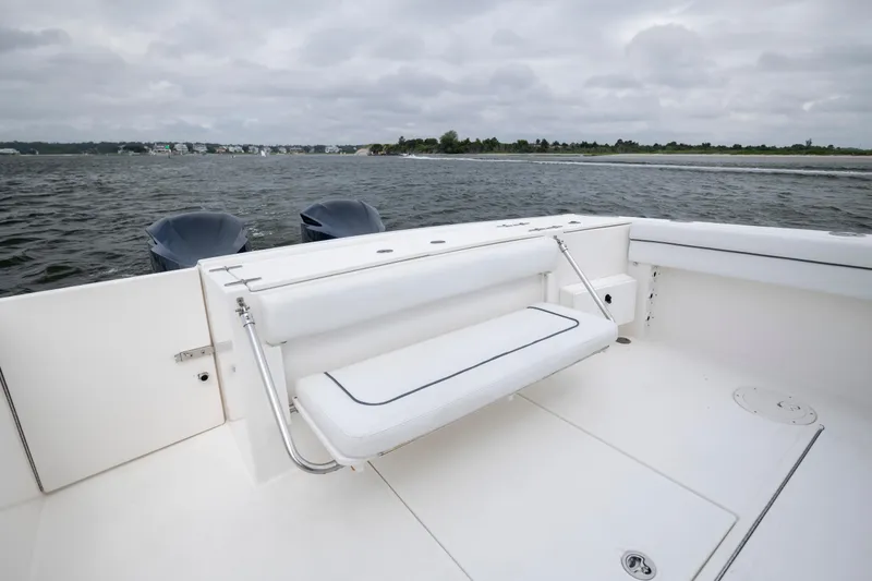 Slide: The Image of 2017 Stamas 370 Aegean boat with white seating, dual engines, and scenic water view. - 13