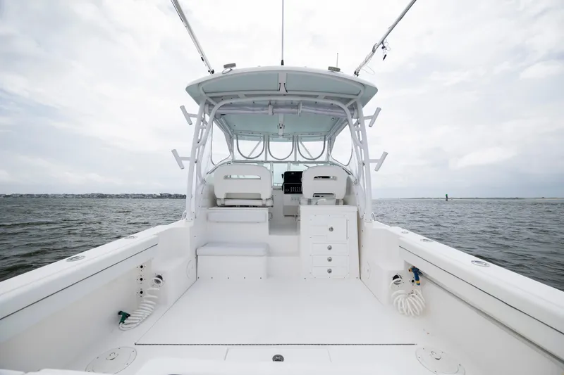 Slide: The Image of 2017 Stamas 370 Aegean boat interior with open deck and helm, on calm waters. - 15