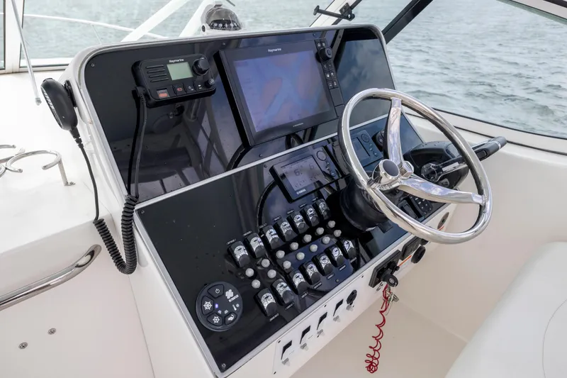 Slide: The Image of Control panel of 2017 Stamas 370 Aegean boat with steering wheel and navigation equipment. - 20
