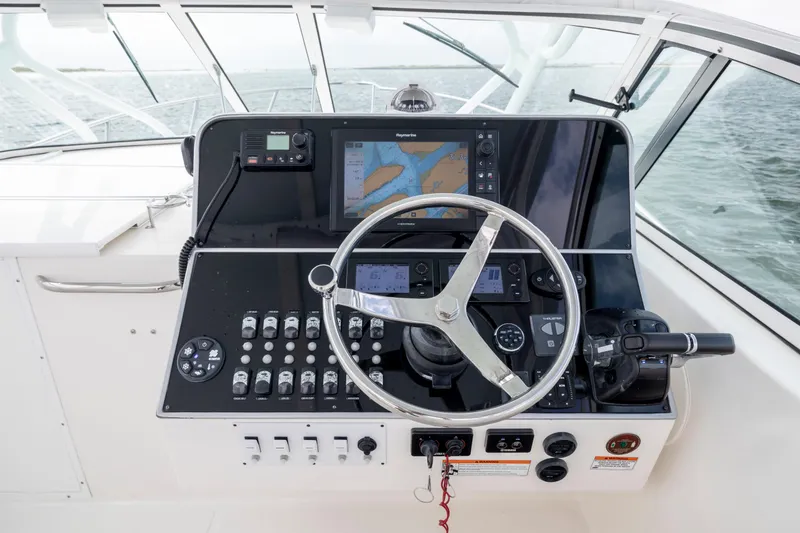 Slide: The Image of 2017 Stamas 370 Aegean helm with navigation controls and steering wheel. - 22