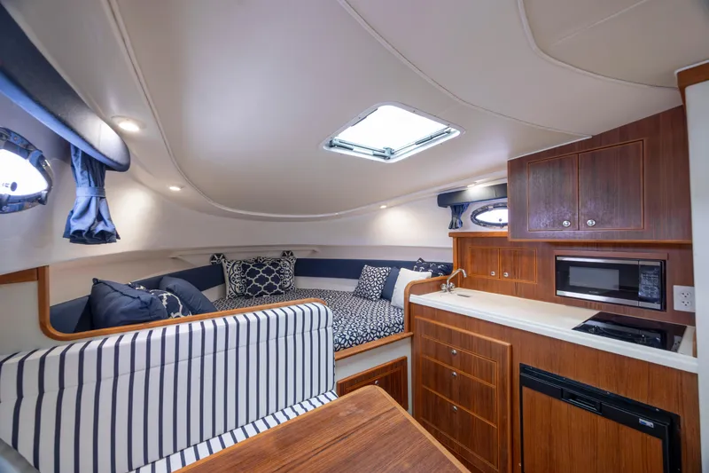 Slide: The Image of Luxurious interior of 2017 Stamas 370 Aegean yacht with cozy seating and kitchenette. - 27