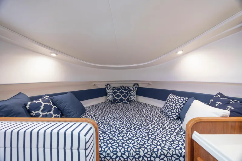 Slide: The Image of 2017 Stamas 370 Aegean cabin with nautical-themed bedding and cozy lighting. - 36