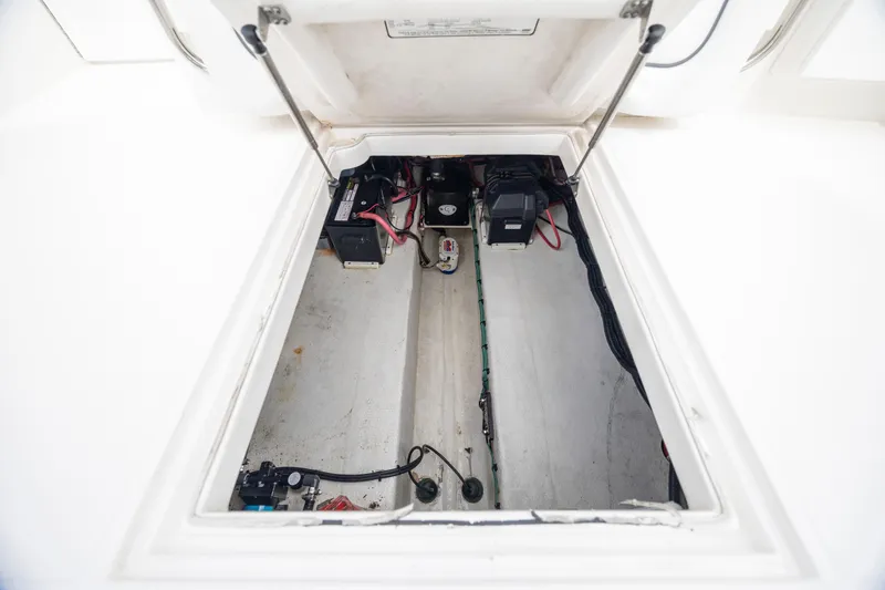 Slide: The Image of 2017 Stamas 370 Aegean boat battery compartment with wiring and components. - 42
