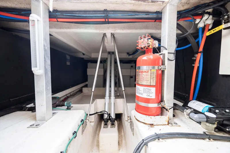 Slide: The Image of 2017 Stamas 370 Aegean engine compartment with fire extinguisher and hydraulic systems. - 45