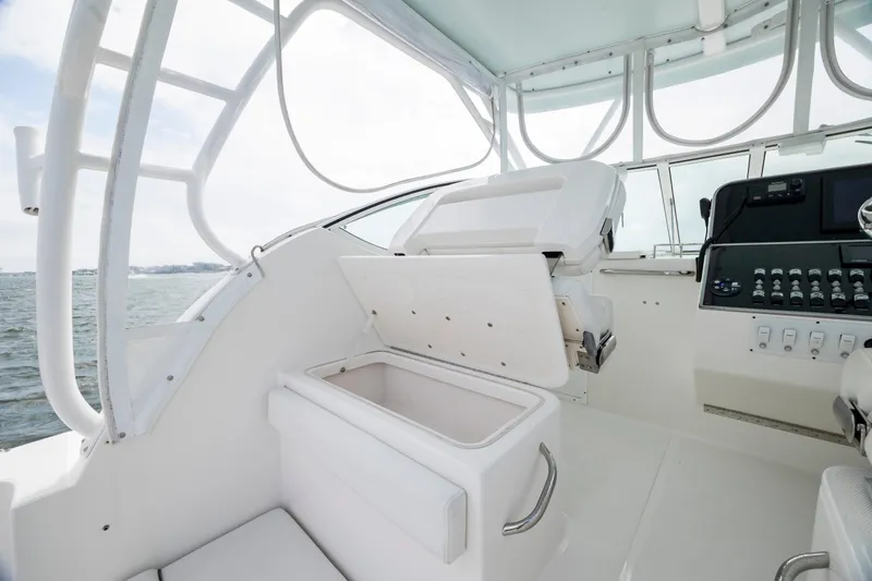 Slide: The Image of 2017 Stamas 370 Aegean boat interior with helm and storage compartment. - 47
