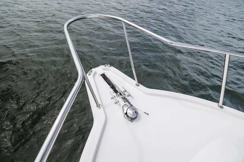 Slide: The Image of Bow of 2017 Stamas 370 Aegean boat with stainless steel railings on water. - 49