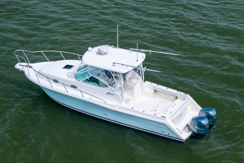 Slide: The Image of 2017 Stamas 370 Aegean boat with dual Yamaha engines on open water. - 8