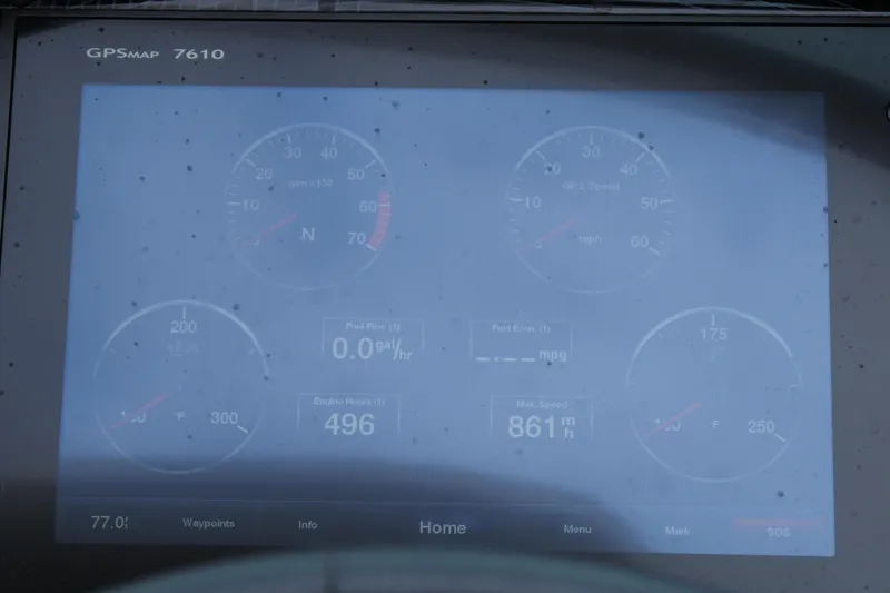Slide: The Image of Dashboard display of a 2018 Regal 2800 Bowrider with GPS and engine metrics. - 16