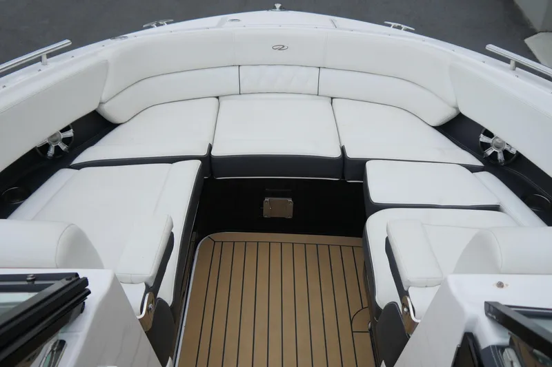 Slide: The Image of 2018 Regal 2800 Bowrider with spacious white seating and teak flooring. - 19