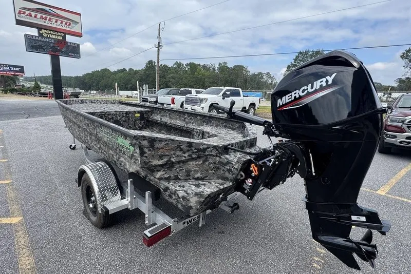 Slide: The Image of 2024 Havoc 1756 MRST boat with Mercury engine on trailer in parking lot. - 6