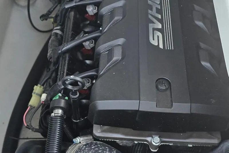 Slide: The Image of 2022 Yamaha Boats 275 SD engine close-up, showcasing intricate mechanical details. - 12