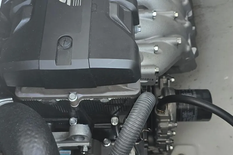 Slide: The Image of Engine of 2022 Yamaha Boats 275 SD, showcasing intricate mechanical components. - 13