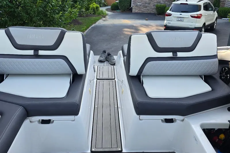 Slide: The Image of 2022 Yamaha Boats 275 SD interior with sleek seating and modern design. - 18