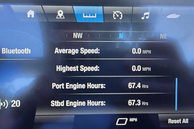 Slide: The Image of Dashboard display of a 2022 Yamaha Boats 275 SD showing engine hours and speed metrics. - 24