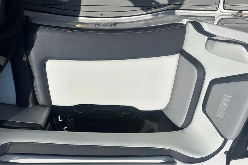 Slide: The Image of 2022 Yamaha Boats 275SD interior seating with sleek, modern design and comfortable upholstery. - 33