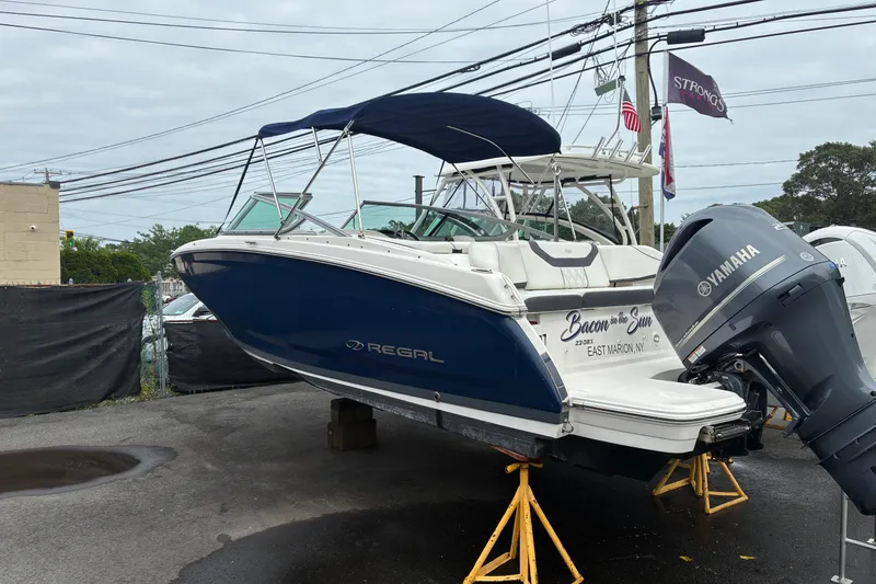 Slide: The Image of 2020 Regal 23 OBX boat with Yamaha outboard motor on display. - 2