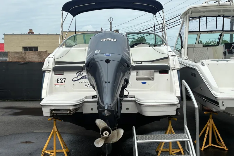 Slide: The Image of 2020 Regal 23 OBX boat with outboard motor on display. - 3